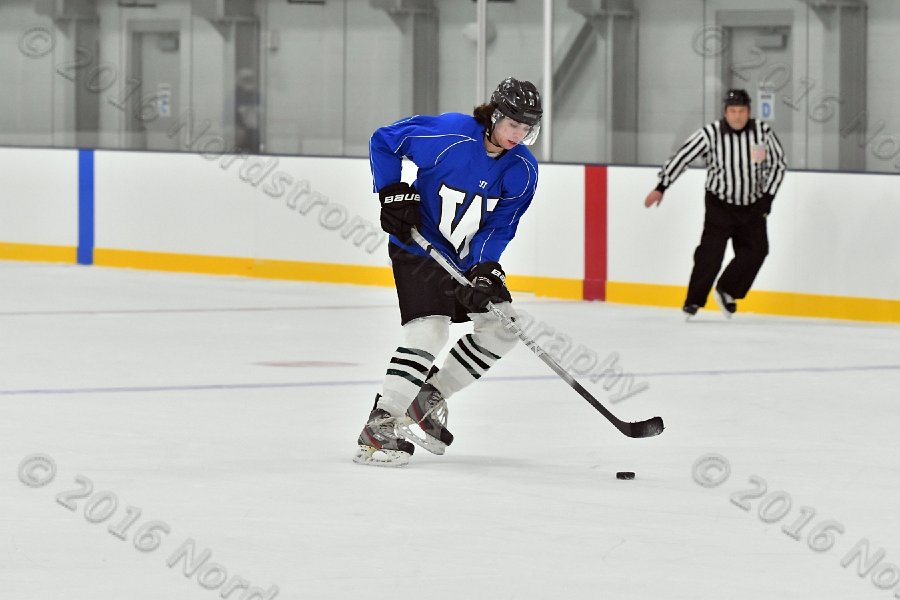 Wheaton College Men\'s Ice Hockey vs Middlesex Community College. - Photo By: KEITH NORDSTROM